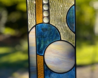 Geometric abstract stained glass window hanging