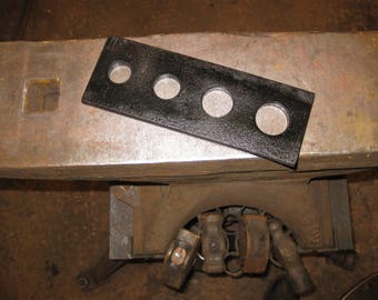 Blacksmith bolster plate, 7/8" to 1-1/4" drift tool