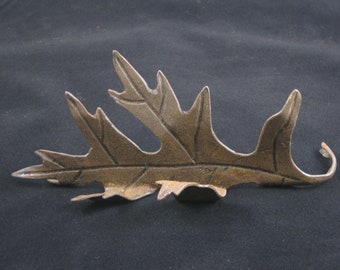 Oak leaf business card holder, ironwork