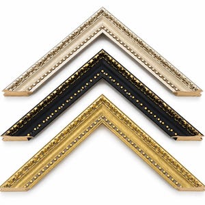 May include: Three V-shaped picture frame corner samples arranged vertically. The top frame is silver with ornate detailing, the middle frame is black with gold accents and a beaded inner edge, and the bottom frame is gold with intricate relief patterns.