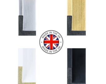 May include: Four different picture frame samples with black, white, silver, and gold colored frames. Each frame has a black mat and a black backing. The frames are made in the UK.