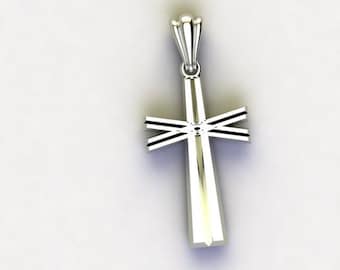 Może przedstawiać: Srebrny wisiorek w kształcie krzyża. Krzyż ma pionową belkę i dwie poziome belki z wzorem w kształcie litery V. Górna część wisiorka ma ozdobną krawędź.
