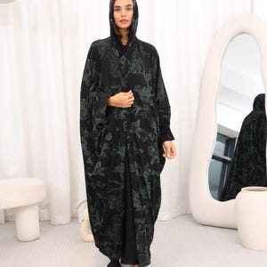 Abaya Tasneem Black & Green – 3 Piece Glitter Jacquard Abaya Set with Satin Inner Dress and Scarf | Elegant Floral Modest Wear for Women