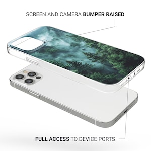 May include: A clear phone case with a misty forest scene printed on the back. The case has raised edges to protect the screen and camera. "SCREEN AND CAMERA BUMPER RAISED" and "FULL ACCESS TO DEVICE PORTS" are printed on the case.