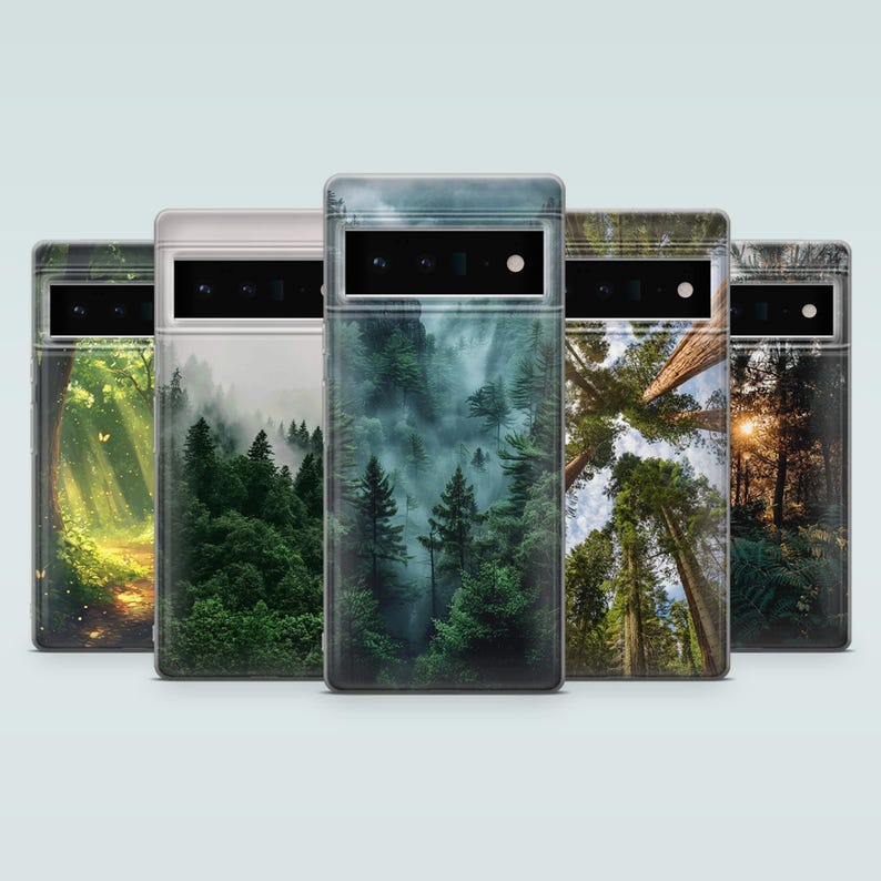 May include: Five different phone cases with forest scenes. The cases are clear and show a variety of forest scenes, including a foggy forest, a forest with tall trees, and a forest with a path.