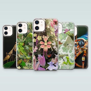 May include: A collection of phone cases featuring insect and floral designs. The cases showcase various insects, including a praying mantis, against backgrounds of leaves, flowers, and natural elements. The cases are in a row, each with a different design.
