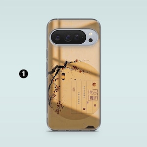 May include: A phone case featuring an Asian-inspired design. The case has a clear border and a tan background with a branch, flowers, and a lantern. The design includes text in a vertical format and a circular element.
