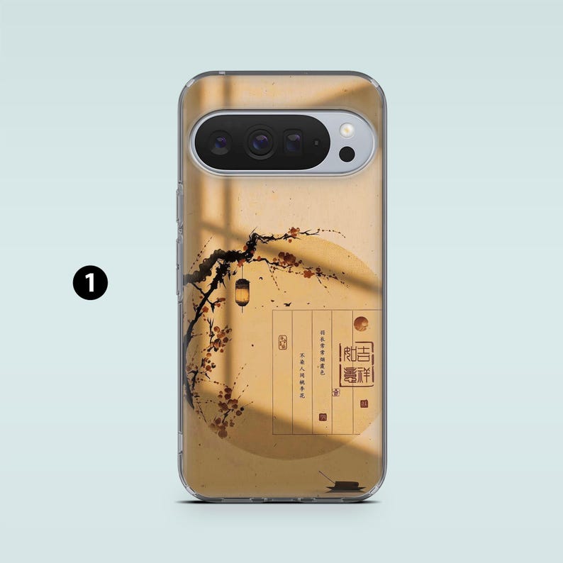 May include: A phone case featuring an Asian-inspired design. The case has a clear border and a tan background with a branch, flowers, and a lantern. The design includes text in a vertical format and a circular element.
