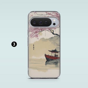 May include: Clear phone case featuring a Japanese-style painting of a red boat on water, with a pagoda and cherry blossom tree. The case has a camera cutout and a number 3 in a black circle.