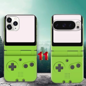 May include: Two smartphone cases featuring a lime green retro handheld gaming console design. The cases include a black directional pad, A and B buttons, and a speaker grille. The top sections are white with cutouts for camera lenses.