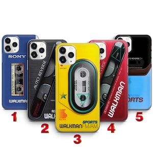 May include: Five smartphone cases featuring retro cassette player designs. The cases are blue, black, yellow, red, and a two-tone black and blue. Each case displays iconic Walkman branding, cassette tape graphics, and technical labels like Auto Reverse.