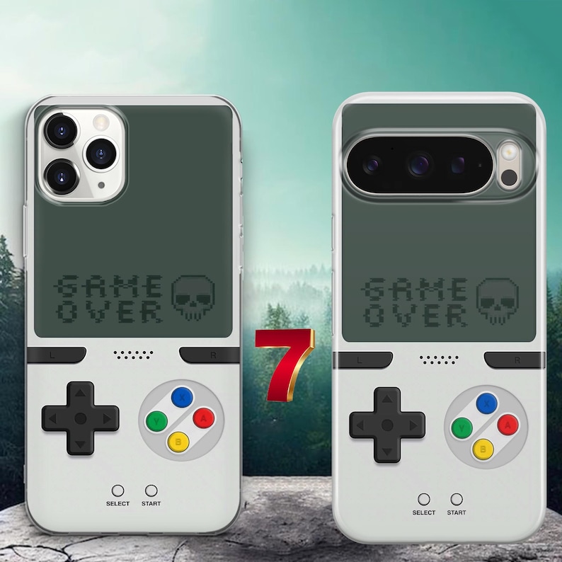 May include: Two smartphone cases featuring a retro handheld gaming console design. The top half is dark gray with the text GAME OVER and a skull icon. The bottom half is white with a black directional pad, four colored buttons, and SELECT START text.