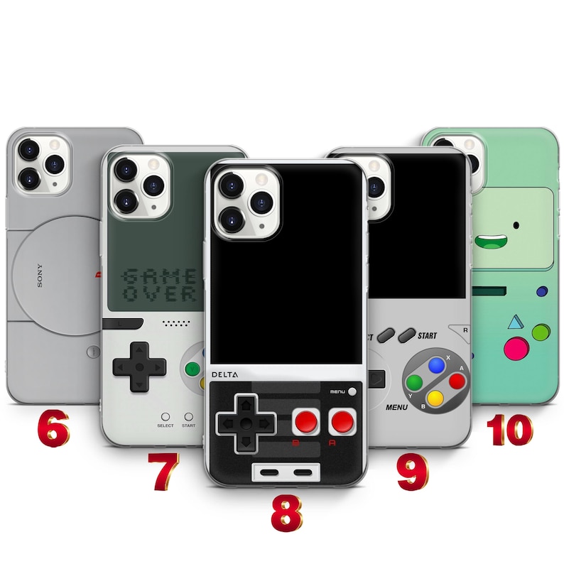 May include: Five smartphone cases featuring retro gaming console designs. The cases display various layouts including a gray Sony-inspired design, a Game Over screen, a black Delta controller, a gray controller with colored buttons, and a green character.