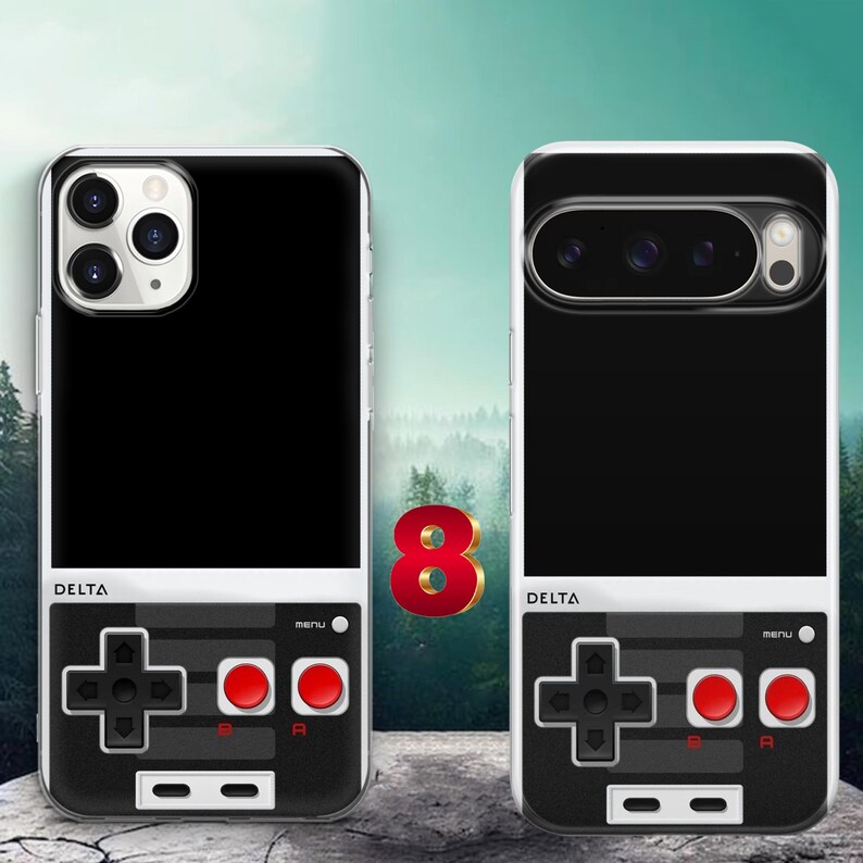May include: Two smartphone cases featuring a black top section and a bottom section designed to look like a retro video game controller. The controller graphic includes a black directional pad, two red buttons labeled A and B, and the word DELTA.