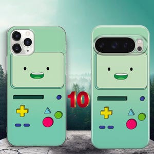 May include: Two light green smartphone cases featuring a cartoon character face with a rectangular screen, a yellow plus sign, a blue triangle, a green circle, a pink circle, and two blue horizontal buttons, arranged in a retro handheld game console style.