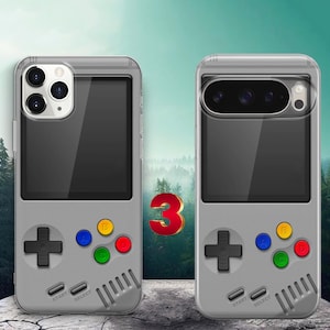 May include: Two grey smartphone cases designed to resemble a handheld video game console. Each case features a black screen area, a black directional pad, and four colored action buttons labeled A, B, C, and D, along with Start and Select buttons.