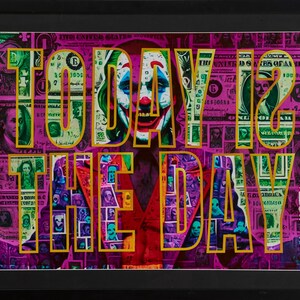 May include: Framed artwork with the Joker's image and the words "TODAY IS THE DAY" in yellow. The background is a collage of dollar bills and a purple hue, creating a striking visual.