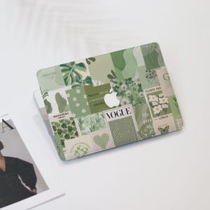 May include: A laptop skin featuring a collage of sage green and white aesthetic imagery, including monstera leaves, daisies, line art faces, a butterfly, and text elements such as VOGUE, London, and motivational quotes, centered around an Apple logo.