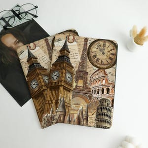 May include: A set of decorative travel-themed items featuring iconic landmarks like Big Ben, the Eiffel Tower, and the Colosseum. The design incorporates a vintage aesthetic with a clock face and aged paper textures, creating a nostalgic travel theme.