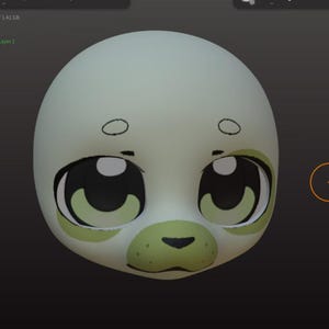 以下が含まれることがあります： 淡い緑色の肌色の3Dレンダリングされた漫画のキャラクターの頭。キャラクターは、黒い瞳と緑色の虹彩を持つ、大きく表現力豊かな目をしています。鼻は濃い緑色で、口は小さな黒い線です。頭は丸く滑らかです。