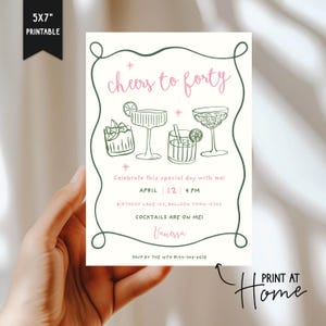 May include: A printable 5x7 inch invitation with the text "Cheers to forty" in pink. The invitation features line drawings of cocktails and includes event details: April 12, 9 PM, and the name "Vanessa". The words "Print at Home" are also visible.