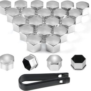 May include: A set of 20 silver-coloured wheel trims, arranged in a pyramid shape. The trims are made of a shiny metal and have a hexagonal shape.