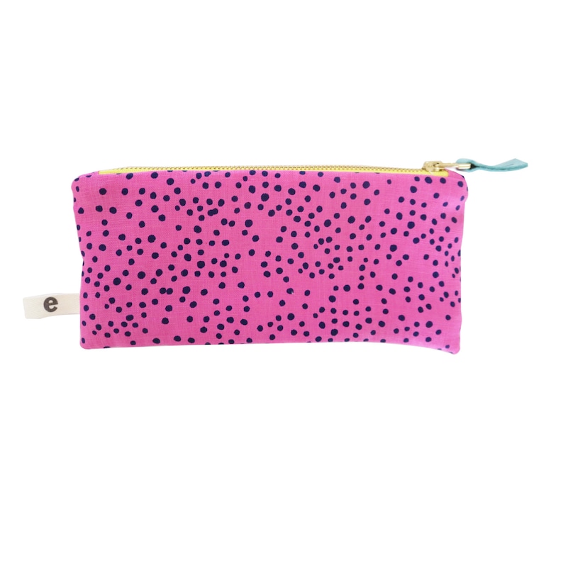 exposed contrasting Navy or Yellow zipper bell pull with leather detail Hot Pink Linen pencil zip in navy polka dot print canvas lined