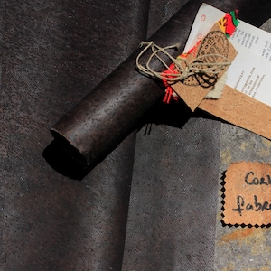 Dark brown cork leather fabric. Premium quality Portuguese cork fabric w/ cotton backing options. DIY leather goods & sewing projects