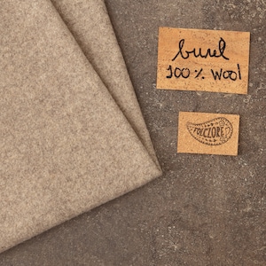 Light pine nut, natural light grey. Portuguese traditional boiled woven full wool fabric.