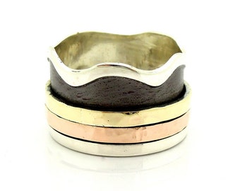 Wavy wide wedding band. Unisex ring with yellow & rose gold spinners