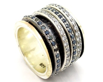 Wide spinner ring with Spinel & Zircon stones