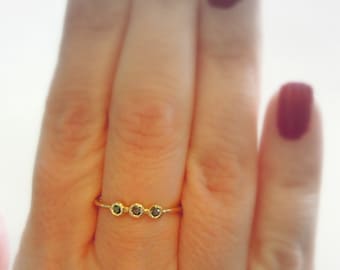 diamond ring Black diamond engagement ring, in a shiny & polished yellow gold band usrael desigmn