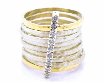 Stacking ring with hammered silver & gold band with 1 zircon bar