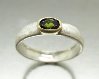 Green tourmaline ring set in 9K Gold and a matte 925 Sterling silver band