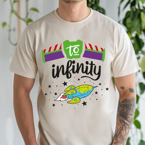 Fun and adventurous To Infinity And Beyond matching shirts featuring a Buzz Lightyear-inspired design. Perfect for couples, families, and Toy Story fans. Made from soft, breathable fabric for all-day comfort, ideal for Disneyland trips, family vacations, or casual wear. Available in multiple sizes and colors for a coordinated look. A great gift for Disney lovers, adding a magical touch to any trip or special occasion!