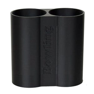 May include: Black bowling ball holder with two circular openings. The word "Bowling" is vertically embossed on the front. The holder is made of a solid, matte black material.
