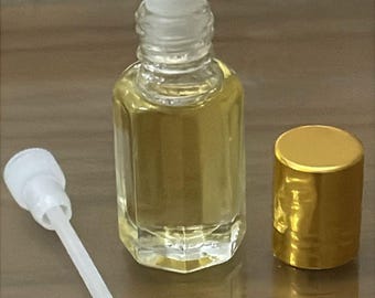 Óleo Perfumado Oud Bouquet: A fragrância abre com um buquê floral vibrante. Óleo Attar sem álcool, perfume árabe vegano, presente para ela e para ele - 6 ml