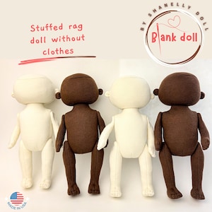 May include: Four unclothed rag dolls, two with light skin and two with brown skin, standing in a row on a white surface. The dolls are made of fabric and have no facial features. The text "Stuffed rag doll without clothes" is written above the dolls. The text "By Shanelly Doll Blank doll" is written in a circle above the dolls.