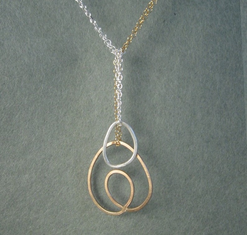 Heart Looped silver and gold necklace image 1