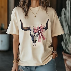 Western Longhorn Skull with Pink Bow Graphic Tee Rustic Chic Cowgirl Shirt Boho Coquette Farmhouse Western Style Comfort Colors T-Shirt