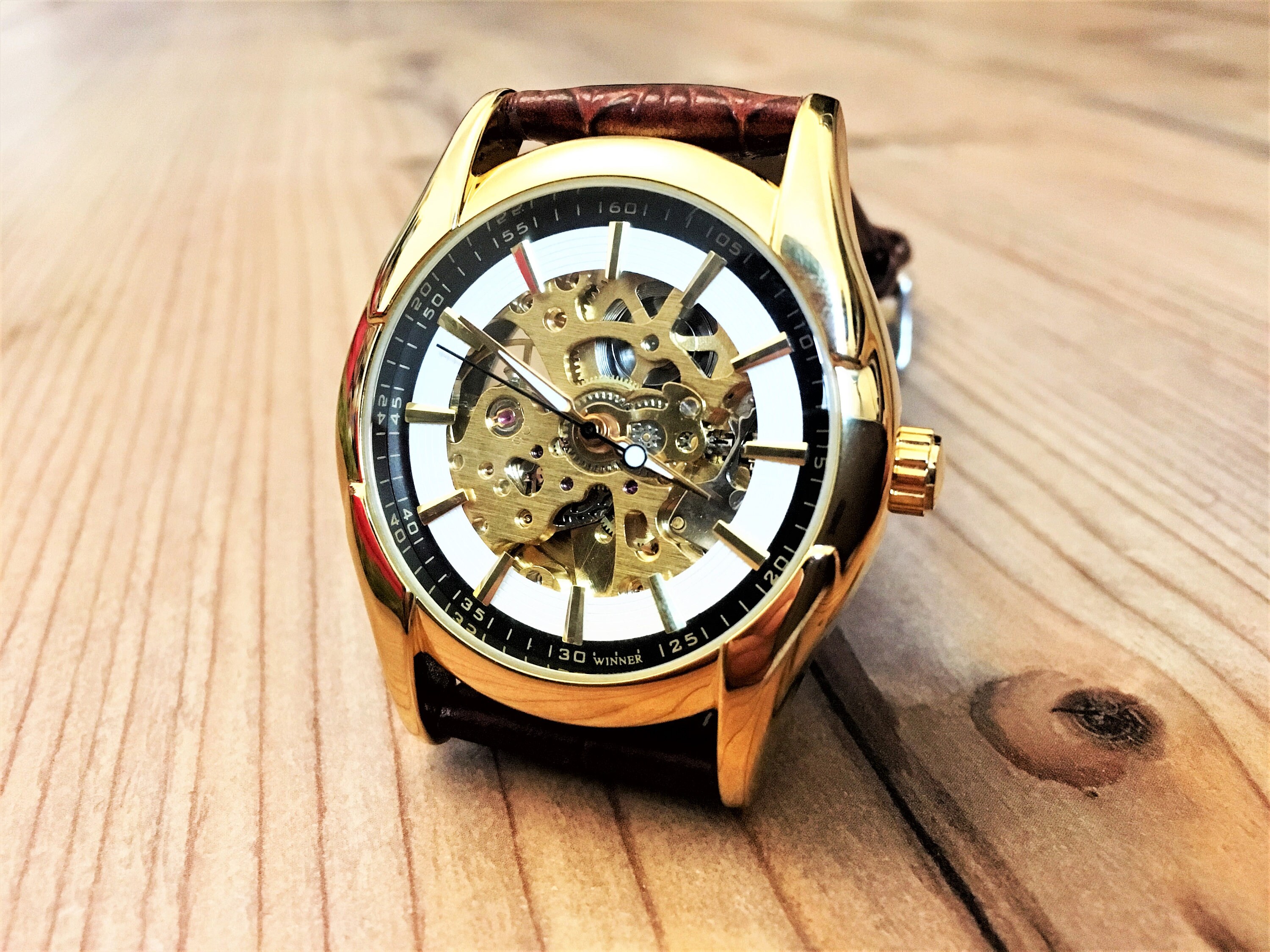 engraved skeleton watch