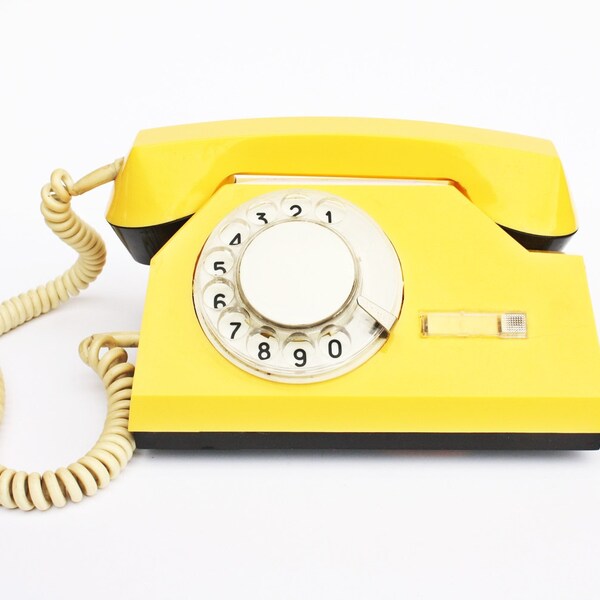 Vintage yellow rotary phone