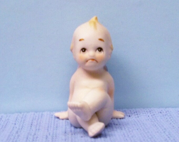 Vintage Lefton Kewpie Doll Figurine Pouting Kewpie Sitting With Leg