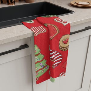 Świąteczny ręcznik kuchenny, czerwony, zdobione ciasteczka, gospodyni, prezent do domu, nowoczesny design, sekretny Mikołaj, dekoracje świąteczne, biały słoń