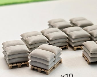 Zakken gestapeld op europallets in schaal H0 (1:87). 10 stuks