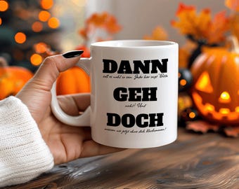 May include: White ceramic mug with black text that reads "DANN soll es wohl so sein. Jeder hier sagt 'Bitte GEH nicht!' Und DOCH missen wir jetzt ohne dich klar kommen!"