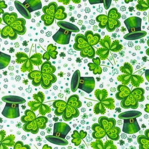 May include: A white background with a repeating pattern of green shamrocks and green leprechaun hats. The shamrocks have a swirl design and the hats have a gold buckle.