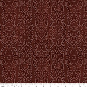 May include: A close-up of a fabric with a repeating pattern of ornate, stylized floral and scroll designs in shades of burgundy and dark red. The pattern is outlined with a lighter, cream-colored stitching, creating a textured effect. The fabric has a subtle sheen.