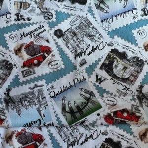 May include: Fabric featuring a repeating pattern of postage stamp designs. The stamps depict scenes of Hogwarts Express, Dragon Alley, and Quidditch Pitch, with a light blue border and white background.