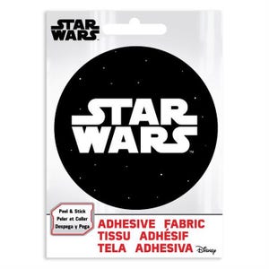 May include: A black and white Star Wars logo on a black circle with white stars. The text "Peel & Stick" is written in English, French, and Spanish. The text "ADHESIVE FABRIC" is written in English, "TISSU ADHÉSIF" is written in French, and "TELA ADHESIVA" is written in Spanish. The text "Disney" is written in white on a red background.